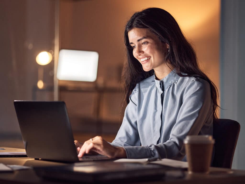 woman managing online community on laptop