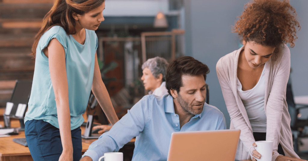 Team members discussing community platforms