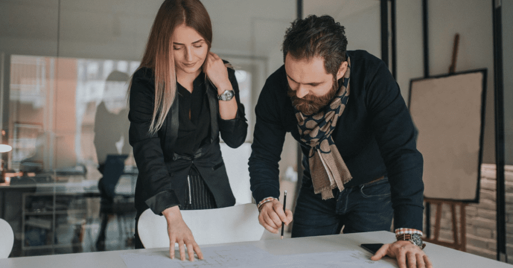 Team members discussing member personas